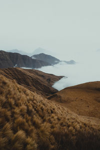 Road through the mountains and clouds