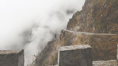Panoramic view of rock formations against sky
