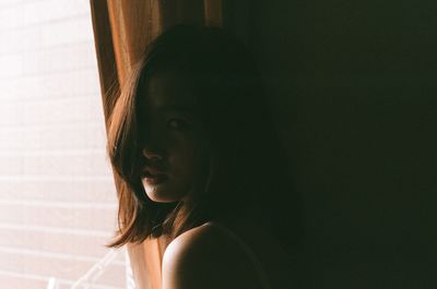 Close-up portrait of young woman