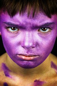 Portrait of child wearing face paint