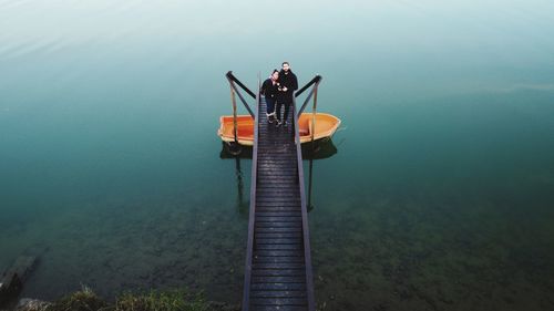 Rear view of couple in the river