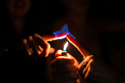 Close-up of person holding hands