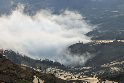 Scenic view of rice terraces at yuanyang county during foggy weather