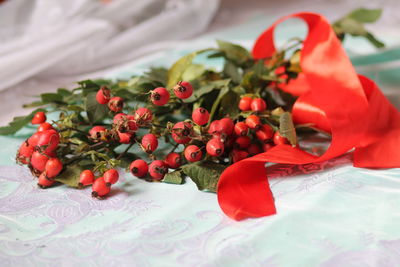 Close-up of red roses on table