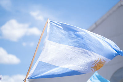 Argentinian flag waving with sky background