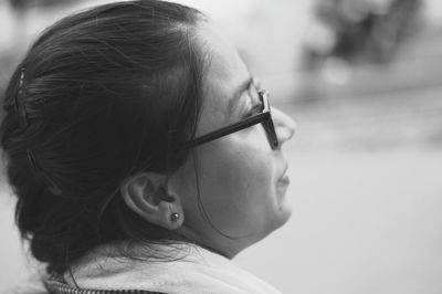 Close-up portrait of a girl looking away