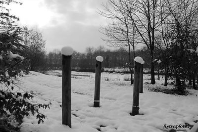 Scenic view of snow covered landscape against sky