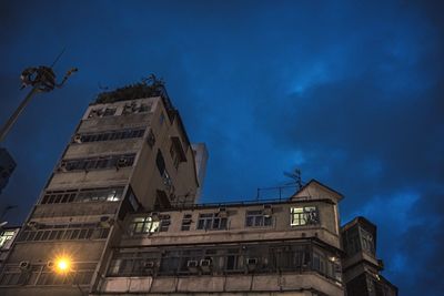 Low angle view of building against sky at night