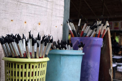 Close-up of multi colored pencils in container