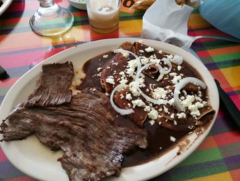 High angle view of cake in plate on table