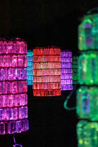 Close-up of pink stack against black background