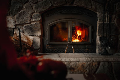 View of burning candles on wood