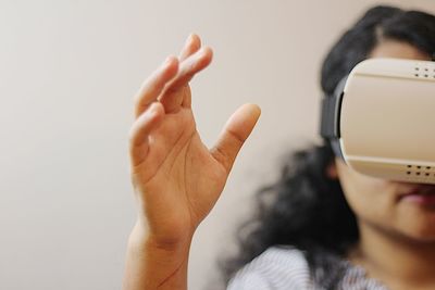 Close up of woman using vr simulator