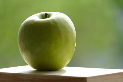 Close-up of apple on table