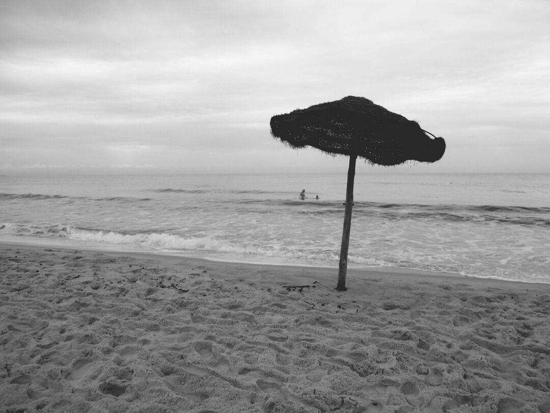 sea, horizon over water, beach, shore, sky, sand, water, tranquility, tranquil scene, scenics, beauty in nature, nature, cloud - sky, idyllic, wave, remote, cloud, coastline, vacations, day