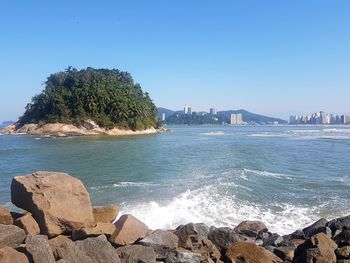 Scenic view of sea against clear sky