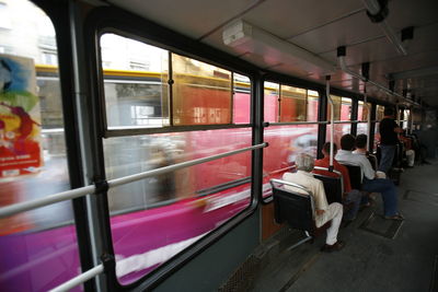 Rear view of man in train