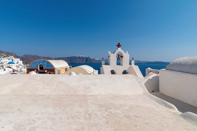 Panoramic view of buildings against clear sky