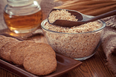 Close-up of bread in glass jar on table