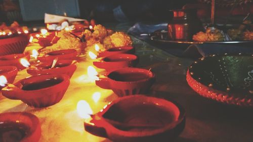 Close-up of candles on table