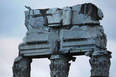 Low angle view of damaged building