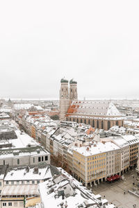 High angle view of buildings in city against clear sky