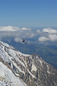 Mountain snow with rescue helicopter 