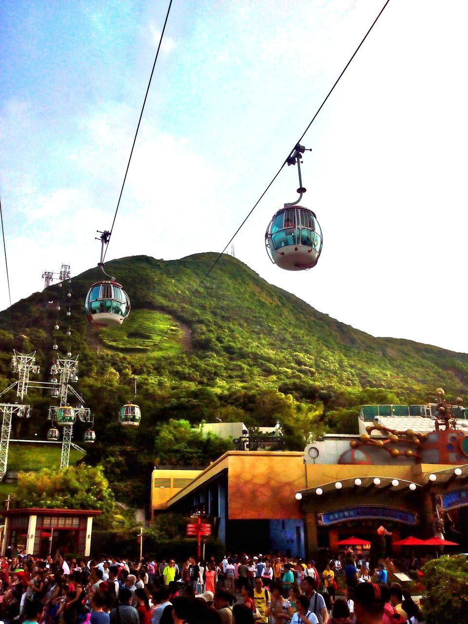 OVERHEAD CABLE CARS AGAINST SKY