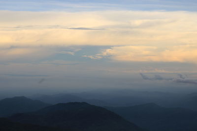 Scenic view of mountains against sky during sunset