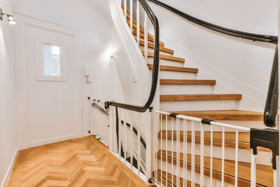 Directly below shot of spiral staircase of building