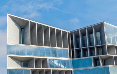 Low angle view of modern building against sky