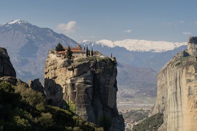 Panoramic view of landscape with mountain range in background