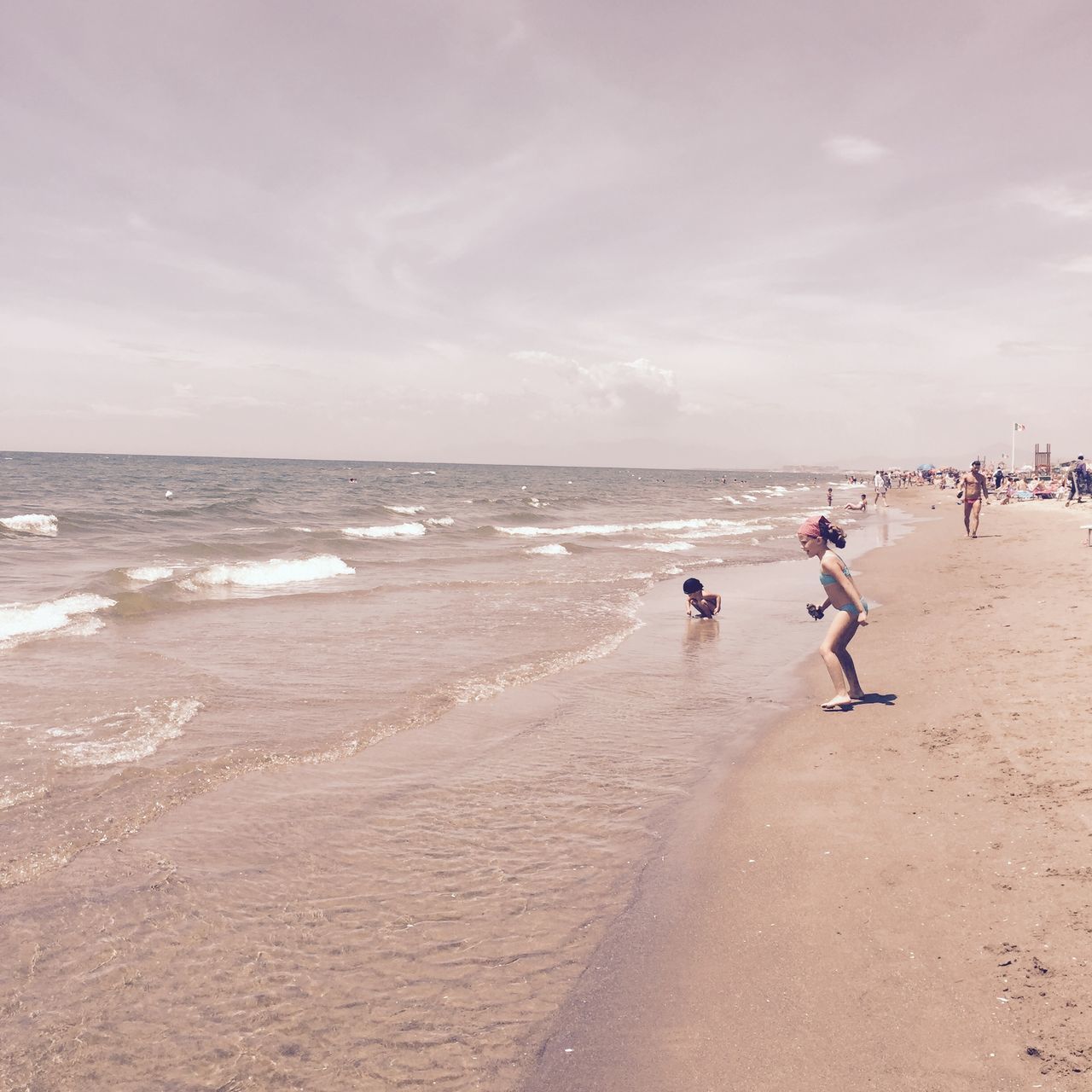 beach, sea, sand, shore, horizon over water, water, sky, leisure activity, vacations, lifestyles, wave, scenics, beauty in nature, nature, cloud - sky, coastline, tranquility, enjoyment, men