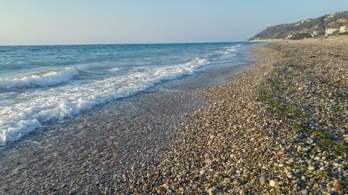 High angle view of shore against sky