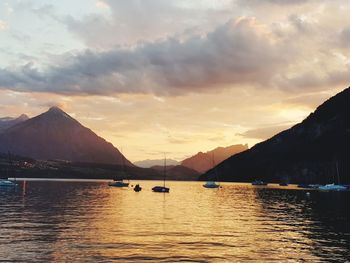 Scenic view of lake against sky during sunset