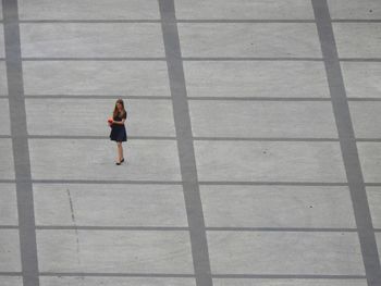 High angle view of woman running on floor