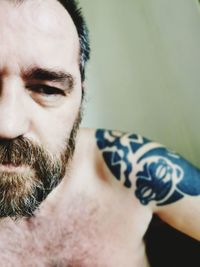Portrait of shirtless man