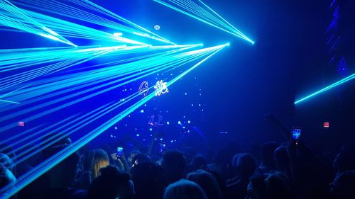 People enjoying in music concert at night