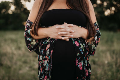 Close-up of woman holding hands