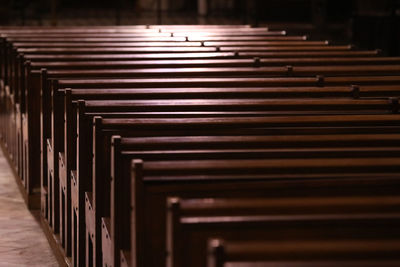 High angle view of wooden benches in a church