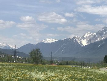 Scenic view of snowcapped mountains against sky