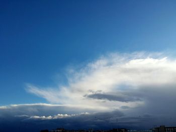 Scenic view of landscape against blue sky