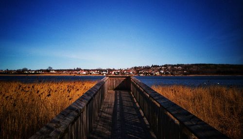 View of calm blue sea against clear sky