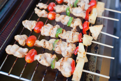 High angle view of food on barbecue grill