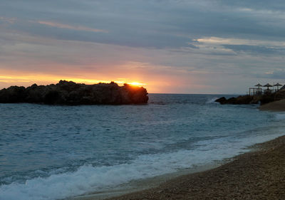 Scenic view of sea against sky during sunset