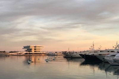 Boats moored at harbor