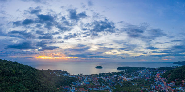 Scenic view of sea against sky at sunset