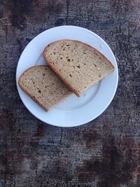 High angle view of bread in plate on table