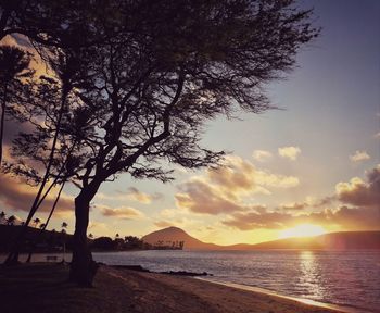 Scenic view of sea against sky during sunset