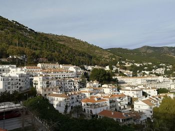 High angle shot of townscape against sky